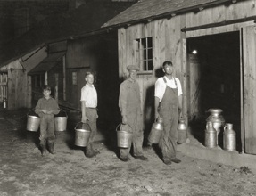 Milker with buckets.